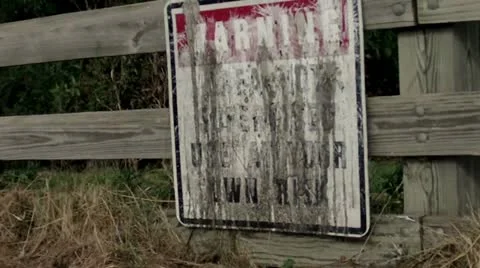 Warning Enter At Your Own Risk Sign (HD) Stock Footage 11330929