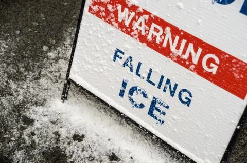 "Warning -  Falling ice" red and white sign in Montreal, Canada Stock Photos