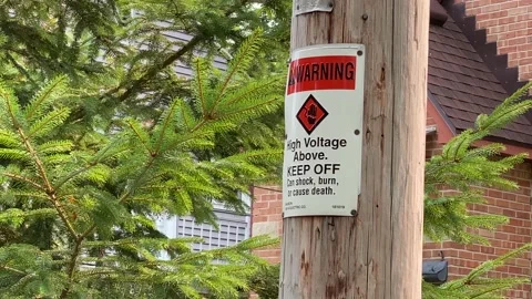 WARNING - High Voltage Above - Keep Off Stock Footage 172505777