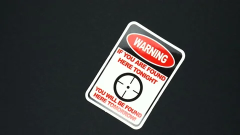 Warning if you are found here tonight you will be found here tomorrow - sign Stock Footage 126668166