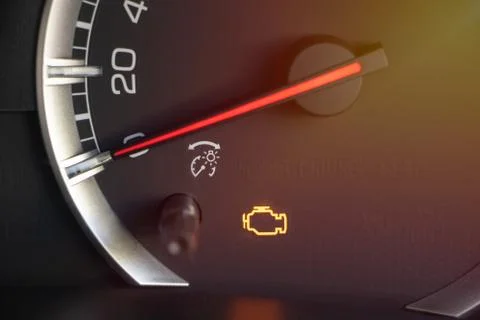 Warning light engine in car dashboard Stock Photos