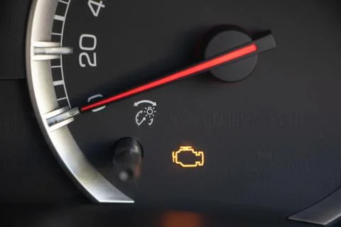 Warning light engine in car dashboard Stock Photos