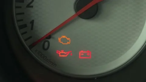 The warning lights on the car dashboard come on. Close-up. Stock Footage 198762340