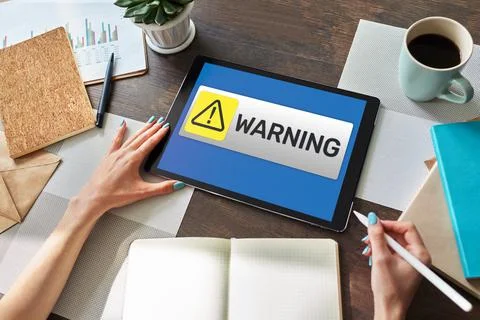 Warning message sign on screen. Virus detection security breathe hardware or Stock Photos