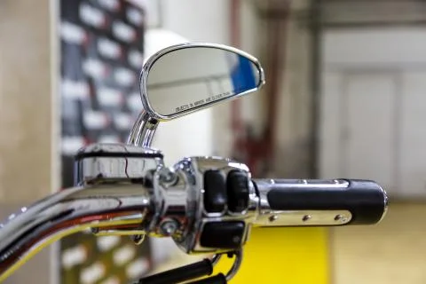Warning. objects in mirror are closer than they appear. Motorcycle mirror Stock Photos