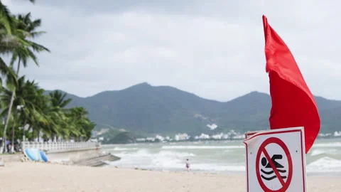 Warning red flag on beach. Stock Footage 293760540