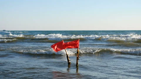 Warning red flags in the water Stock Footage 93461974