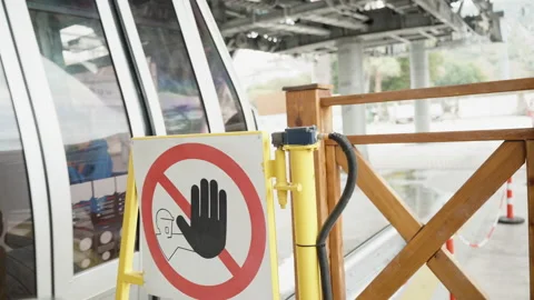 A warning red stop sign on the cable car... | Stock Video | Pond5