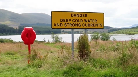 Warning sign about the dangers of cold water swimming  Stock Footage 202930910