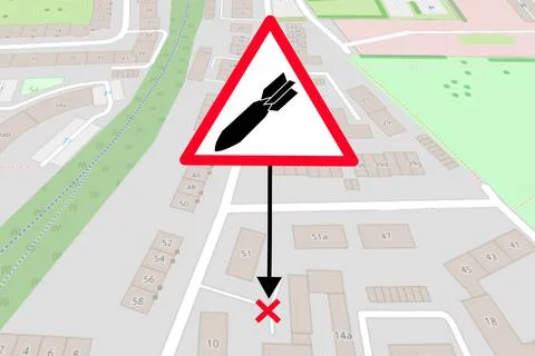 Warning sign about explosive danger on map Stock Photos