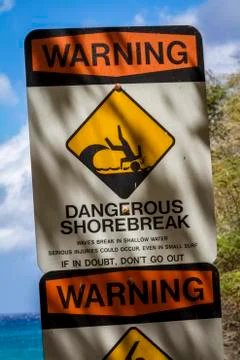 Warning Sign on the Beach 库存照片
