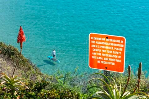 Warning sign on cliff Stock Photos