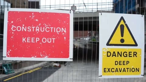 Warning sign of deep excavation keep out on construction site uk Stock Footage 130847848