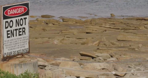 Warning Sign Do Not Enter Near Shore Stock Footage 317657177