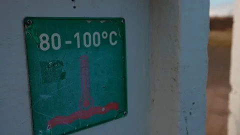 Warning sign of hight temperature, 80-100 celsius, geothermal area in Iceland Stock Footage 174947282