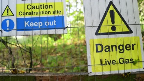 Warning sign of live gas on construction site leeds united kingdom Video stock 163615317