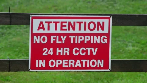 Warning sign no fly tipping 24hr cctv recording leeds united kingdom Stock Footage 163346853