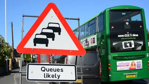 Warning sign of queuing traffic likely at roadworks leeds united kingdom Stock Footage 144817470