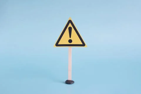 The warning sign is a yellow triangle with a question mark Stock Photos