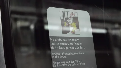 Warning sticker in moving metro train, Paris 動画素材 90188681