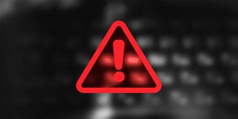 Warning Symbol with Exclamation Mark on blured background with keyboard Illustrazione stock