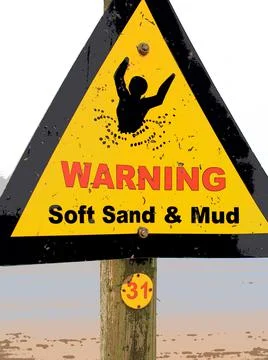 Warning triangle sign - Soft sand and mud Stock Photos