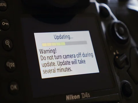 Warning - Updating message - Photo camera firmware update Stock Footage 71235142
