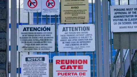 Warnings and Public Notices on School Gate Stock Footage 237842829