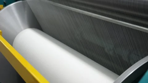 Warping machine close-up, loom, roller mechanism, fabric manufacturing process Stock Footage 271729388