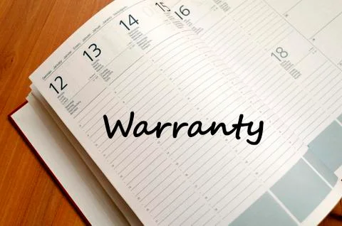 Warranty write on notebook Stock Photos
