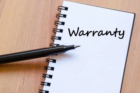 Warranty write on notebook Foto stock