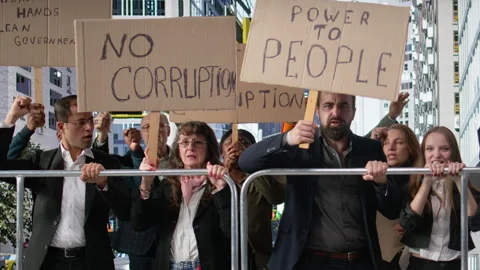 Warring crowd of activists chanting against corruption and political misconduct Stock Footage 325920059