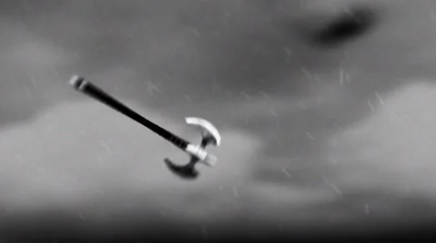 A Warrior Axe Thrown Towards an Enemy in a Battle Stock Footage 68823604