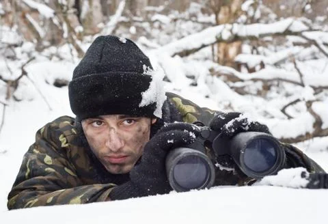 Warrior with binoculars on position.ambush.commando. Stock Photos