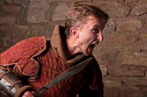Warrior in dungeon Stock Photos