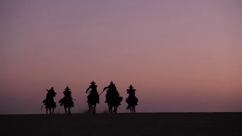 Warrior horsemen silhouette Stock Footage
