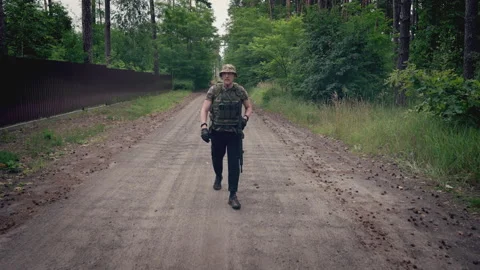Warrior patrols the road Stock Footage 245799497