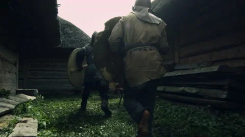 Warriors are Fighting during Attack on Village during Slavs and Vikings Festival Stock Footage 68563600