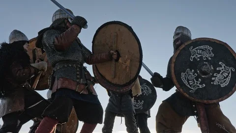 Warriors of vikings are fighting during attack at winter time. Stock Footage 111569061