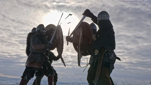 Warriors of vikings are fighting during attack at winter time. Stock Footage 115181599
