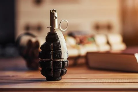 Wars grenade and explosive book Koran, holy war, terrorism. Peace in the worl Stock Photos