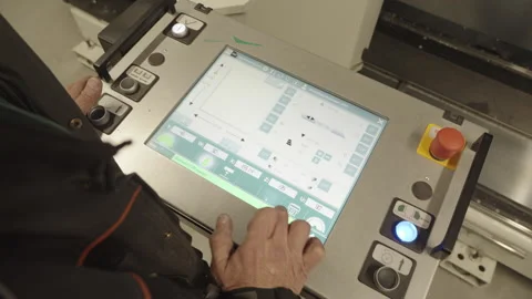 Warsaw, 5 Feb, 2026. Engineer is programing Cnc machine Stock Footage 332265408