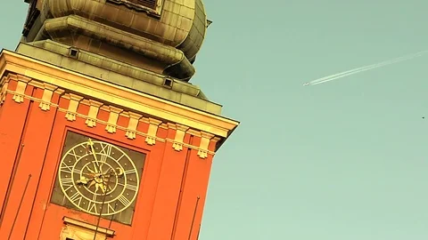 Warsaw plane going behind castle tower Stock Footage 75908880