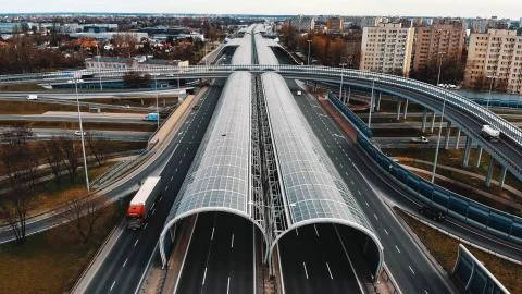 Warsaw, Poland, 03.20.2020. - The anti-noise glass tunnel and overpass Trasa  Stock Photos