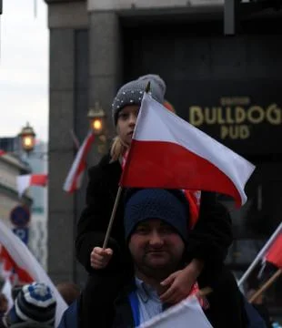 Warsaw, Poland – 11/11/2019 - Polish girl with Polish flag Stock Photos