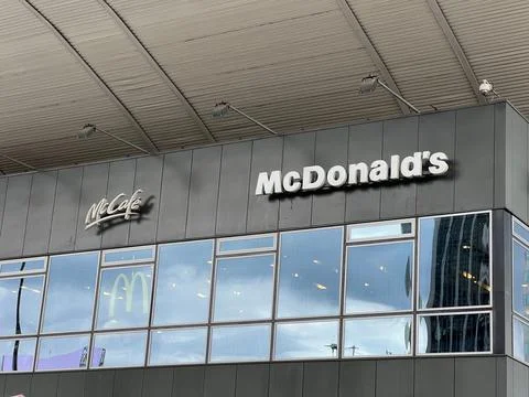 WARSAW, POLAND - JULY 17, 2022: Shopping mall with McCafe and McDonald's logo Stock Photos
