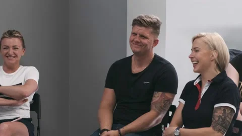 WARSAW, POLAND - June 10, 2019: students listens to speaker at the hair academy Stock Footage 132579853