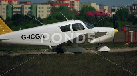 WARSAW, POLAND - MAY, 13, 2017. Telephoto lens shot of Piper PA-28-140 light Stock Photos
