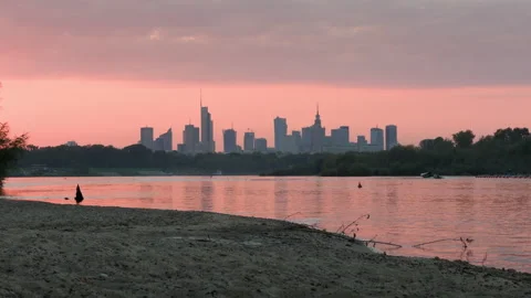 Warsaw skyline cityscape view from the side of Vistula river during pink su.. Stock Footage 296083616