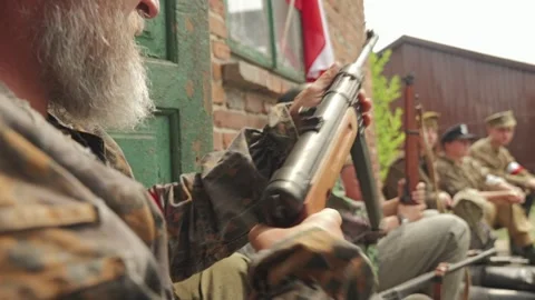 Warsaw Uprising reenactor checking MP 41 submachine gun Видео 339203310